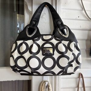 Black & White Circle-Pattern Shoulder Bag with Silver Accents